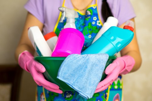 Carpet cleaning technician preparing safe equipment at a property