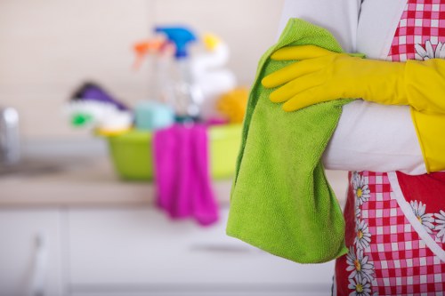 Staff following safe carpet cleaning procedures